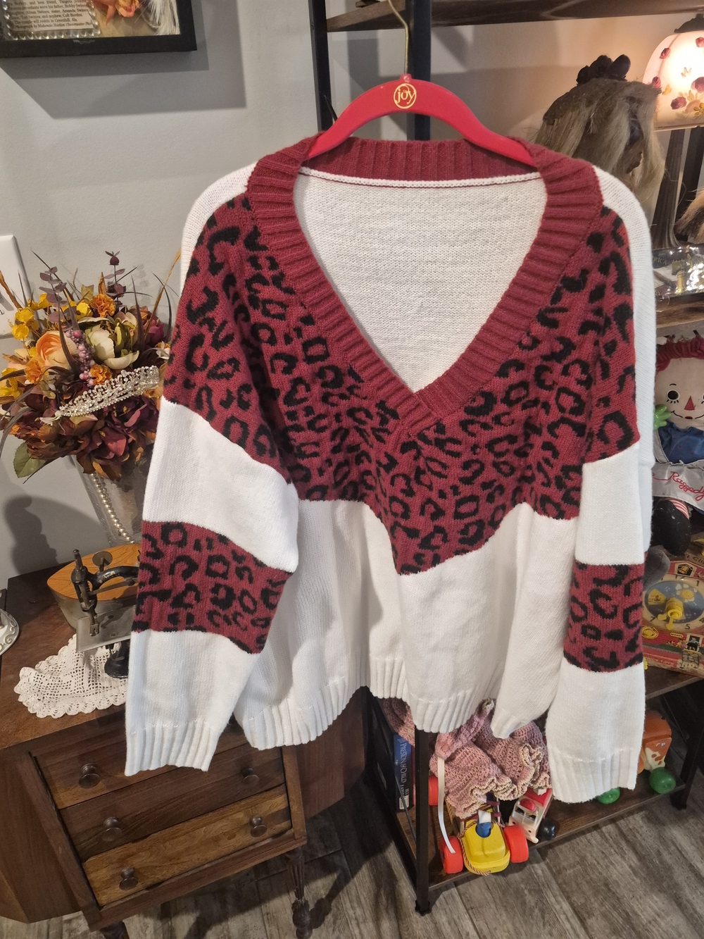 Women’s Red Leopard Print V‑Neck Sweater with White Block Panels